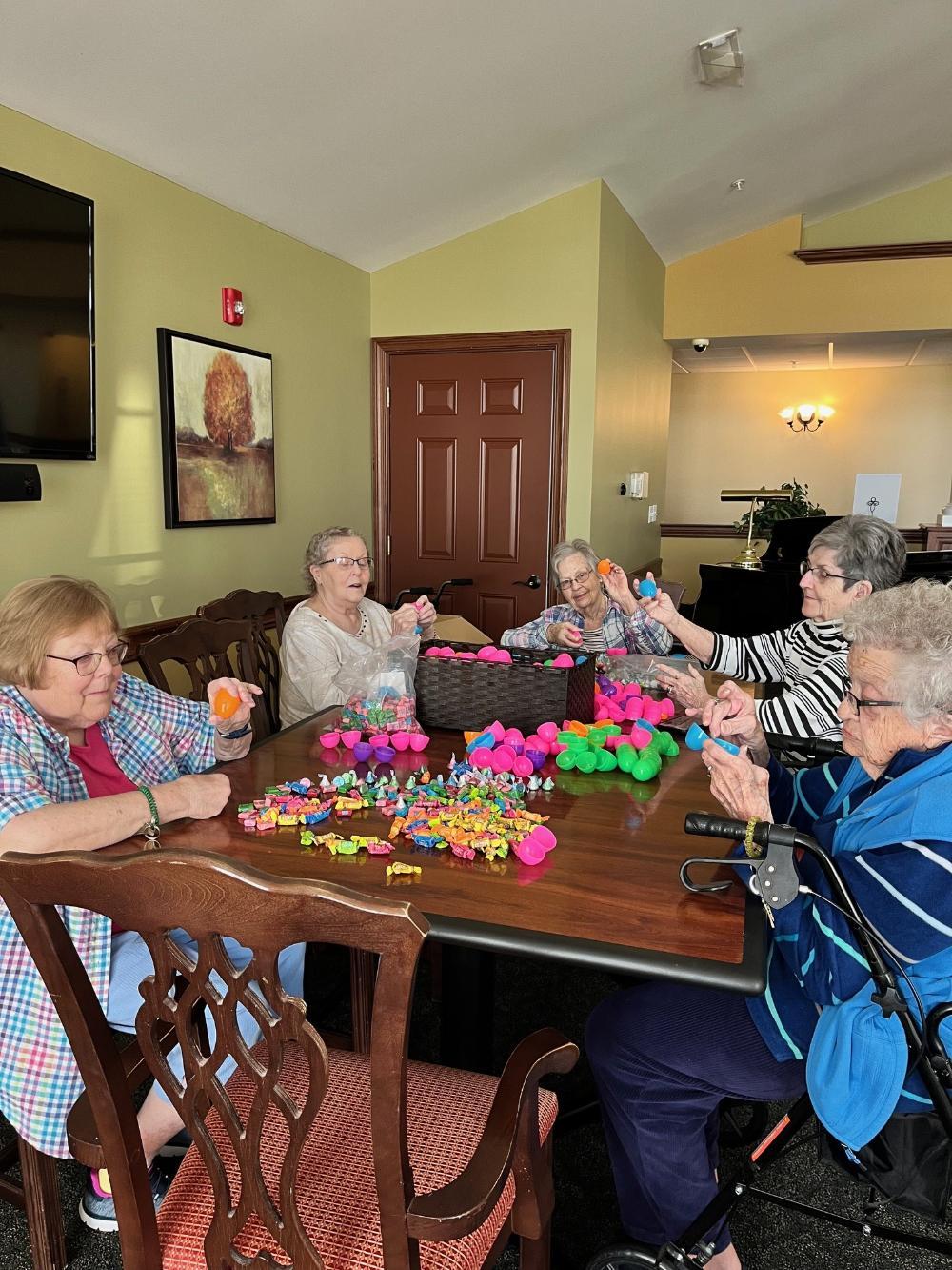 Liberty Village, Hawthorne Inn residents helping stuff the over 8,000 eggs!